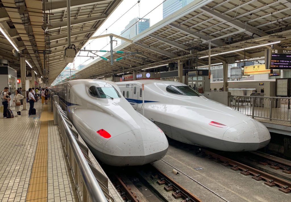 White Bullet Trains in Train Station
